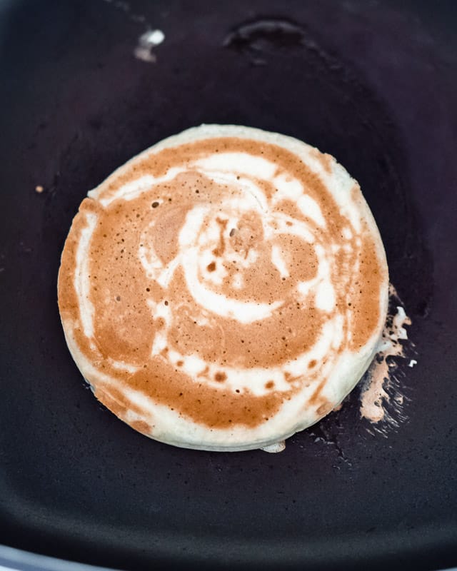 cooked protein pancake in a pan.