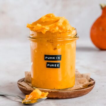 big jar of homemade pumpkin puree
