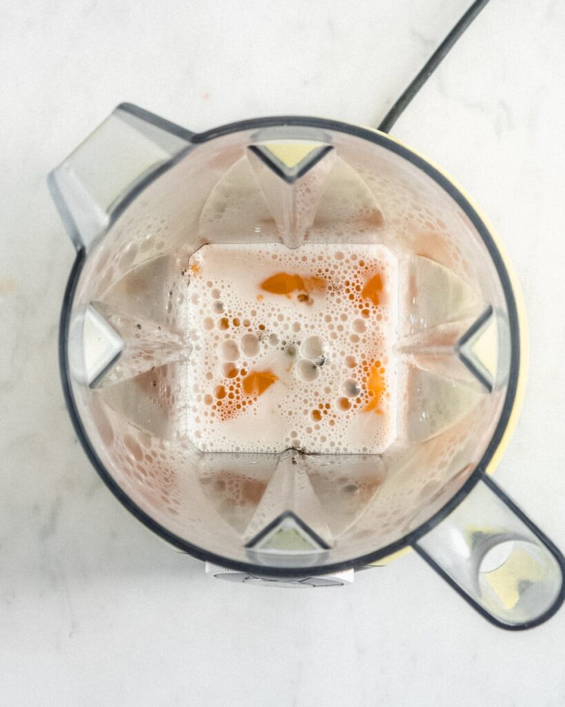 eggs, maple syrup and almond milk in a blender