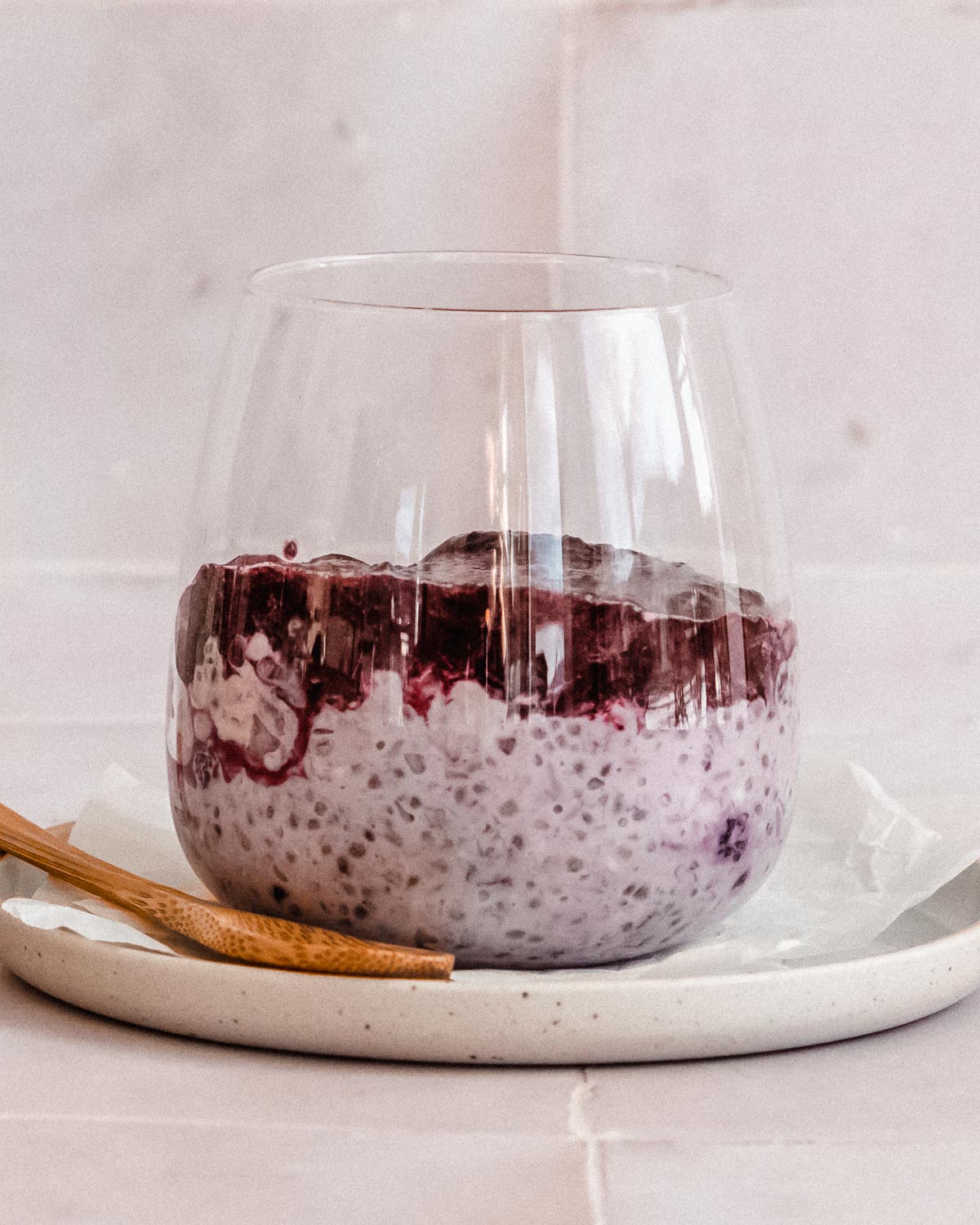 glass filled ⅓ with overnight oats with frozen fruit mixture, then a layer of pureed fresh blueberries