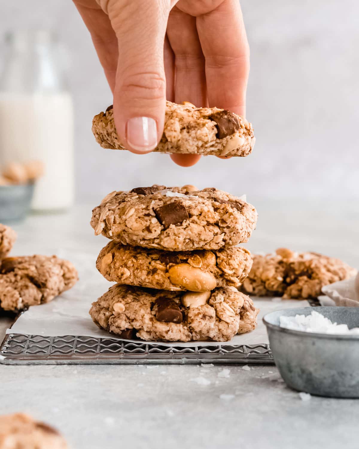 stack of peanut butter oatmeal cookies topped with sea salt
