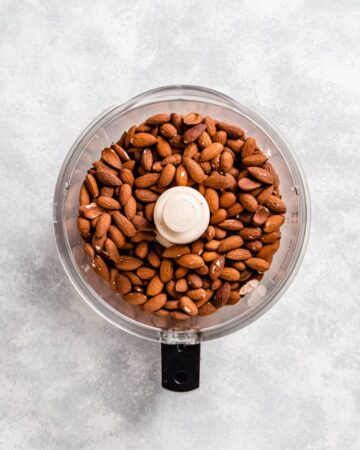 roasted almonds in a food processor.