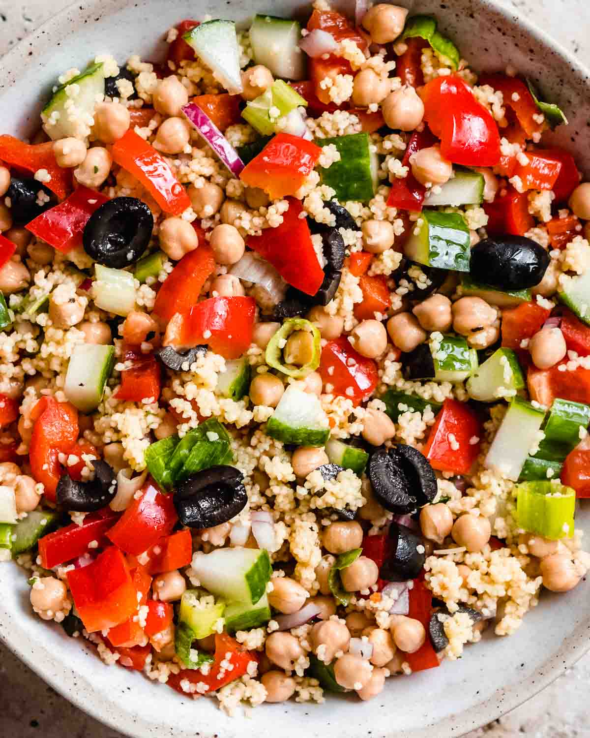 close up of couscous salad in a bowl.
