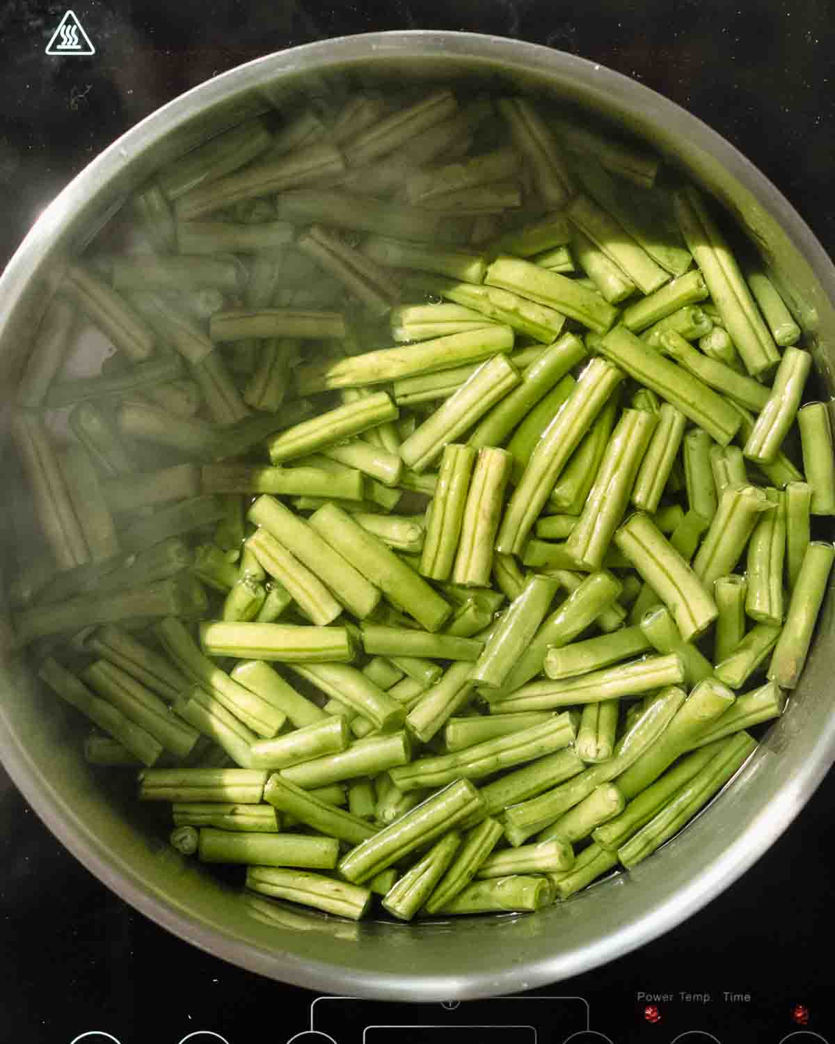 green beans and water in a large pot.