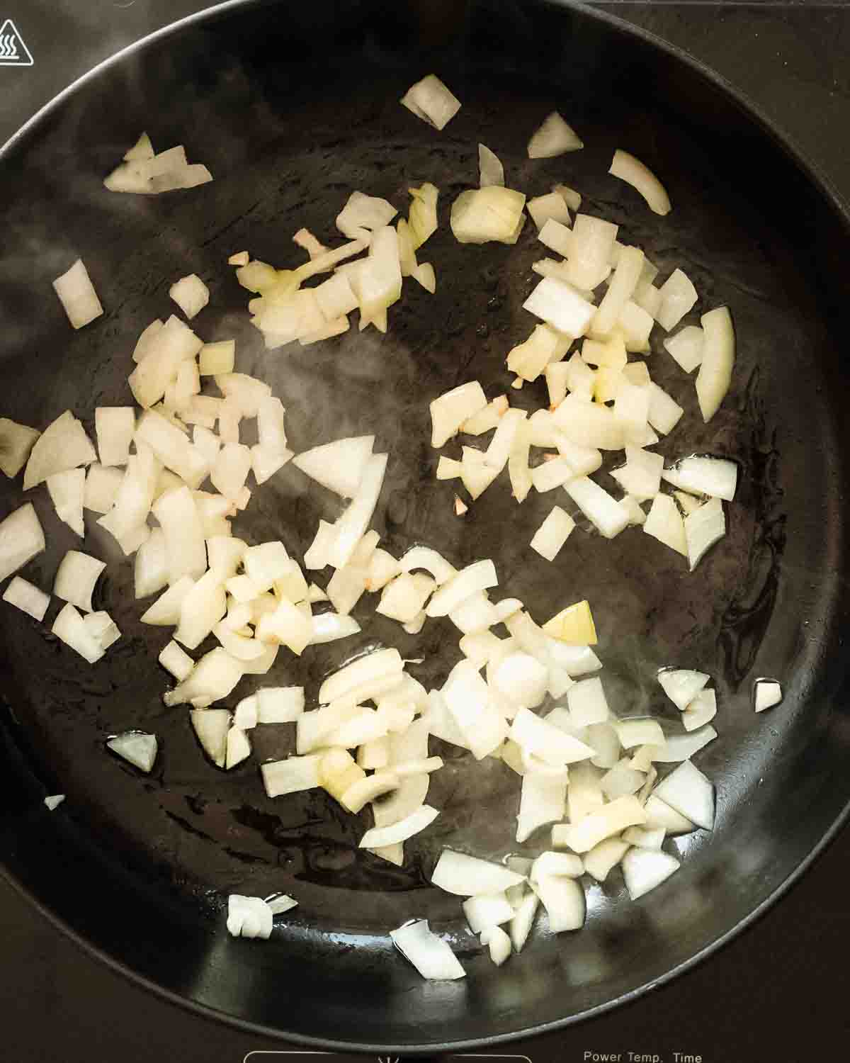 onion sauteed in a pan.