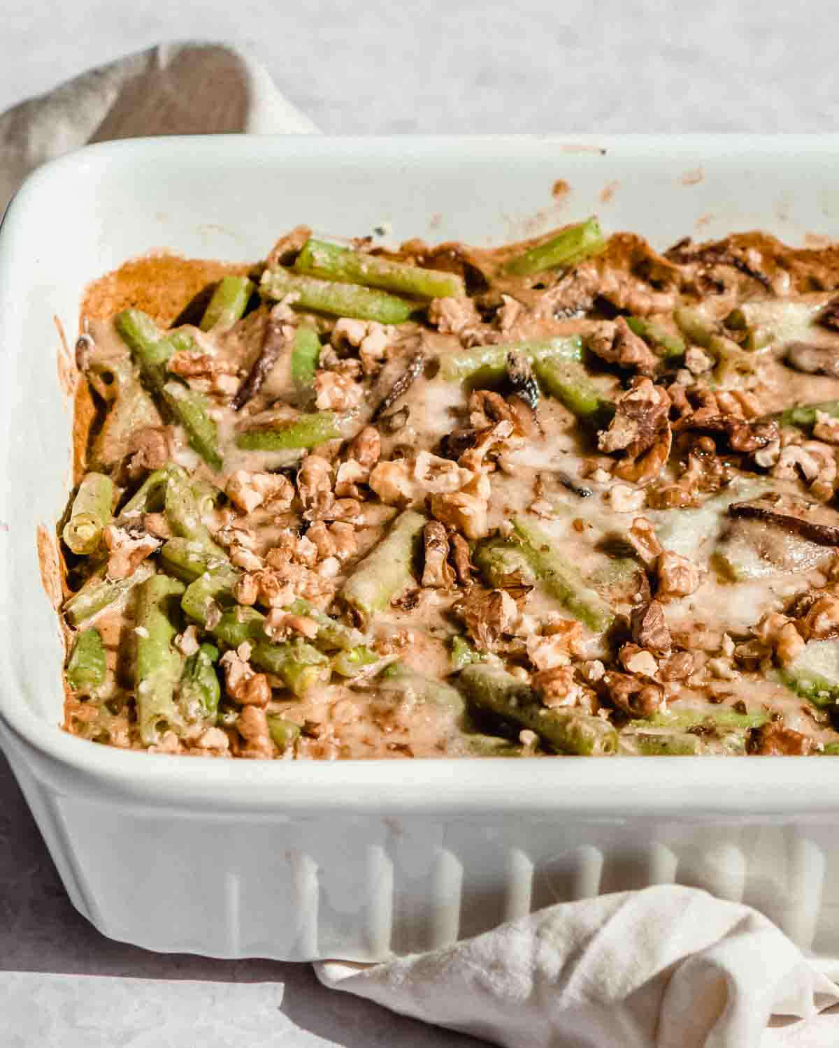 green bean casserole without mushroom soup in a baking tray.