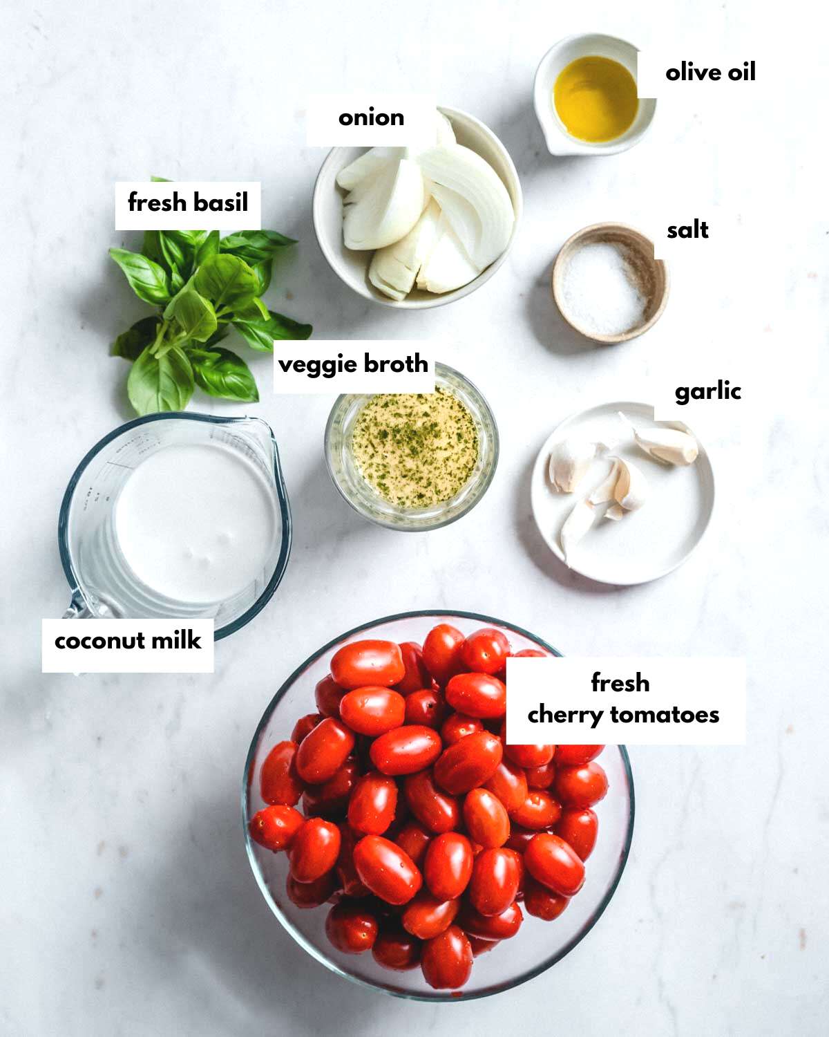 all ingredients needed to make a roasted cherry tomato soup.