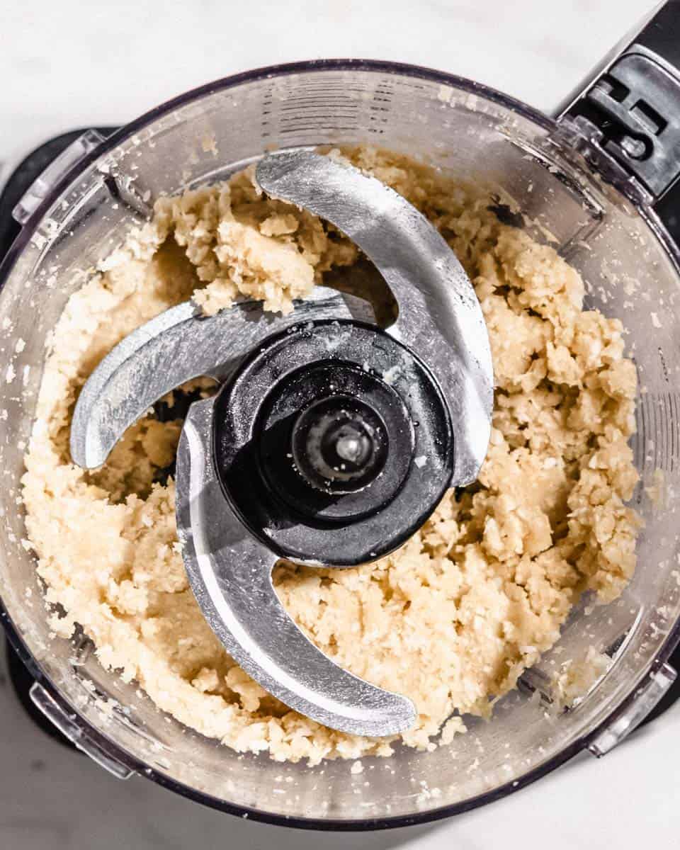 Blended protein ball dough in a food processor.