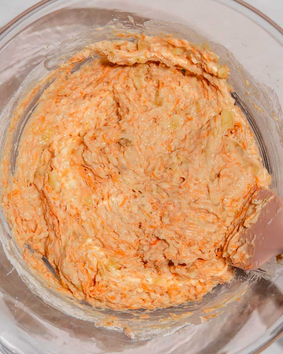 Carrot banana muffin dough in a bowl.