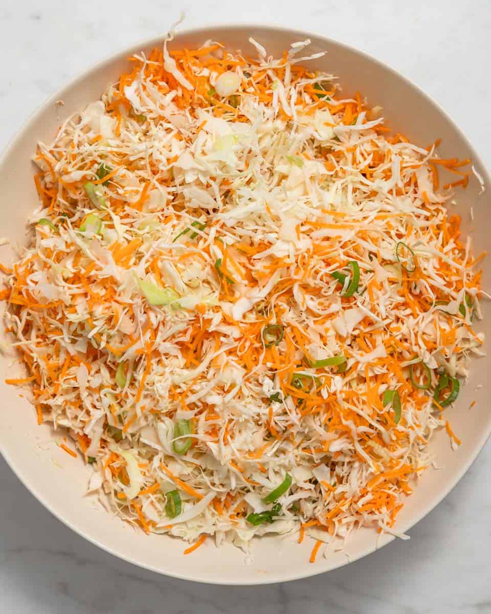 All veggies for the fritters in a bowl.
