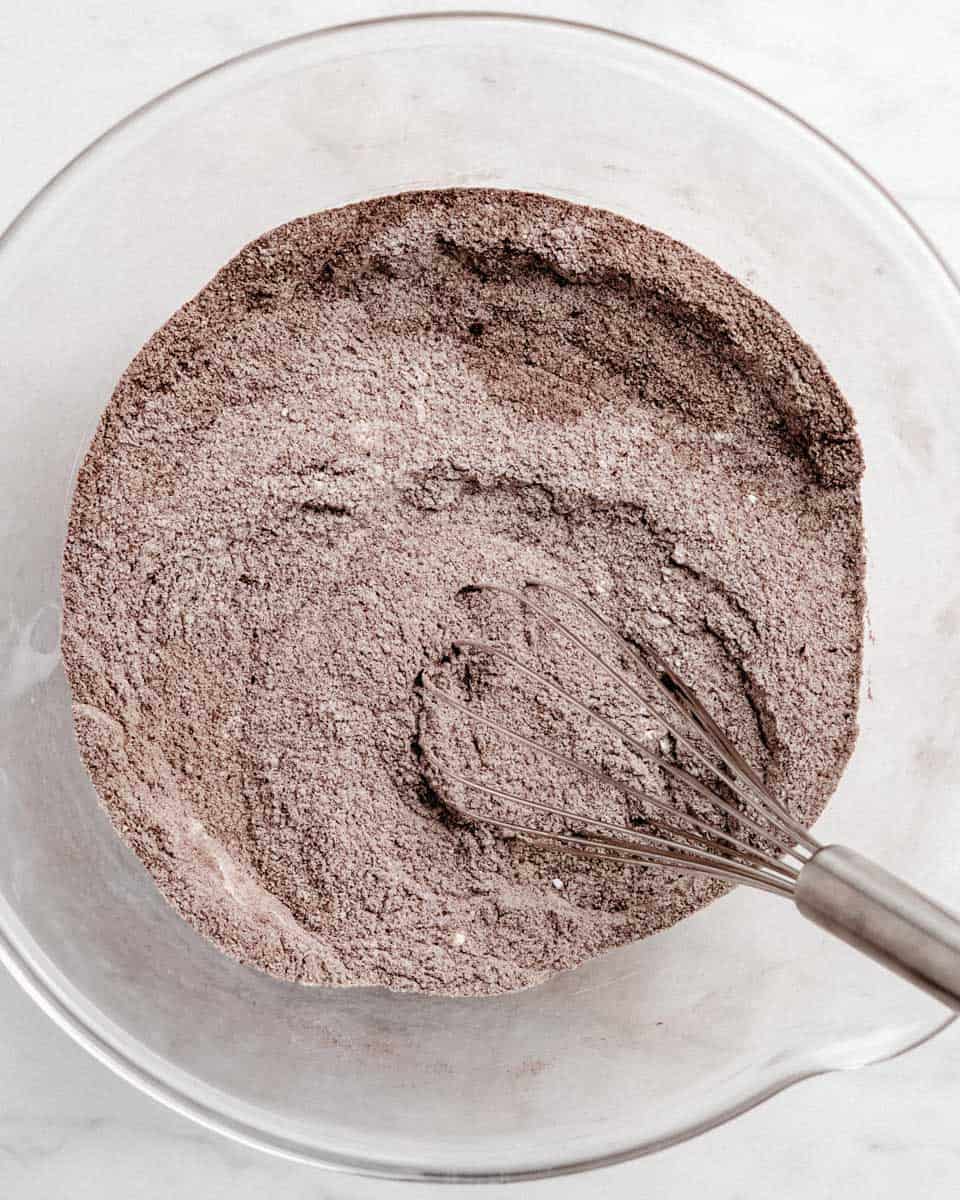 Dry ingredients whisked together in a bowl.
