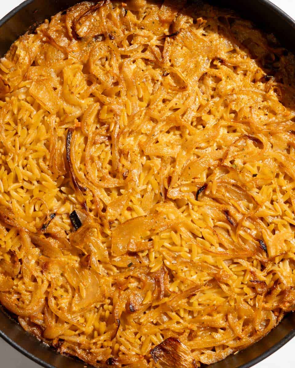 Finished baked orzo in a dutch oven.